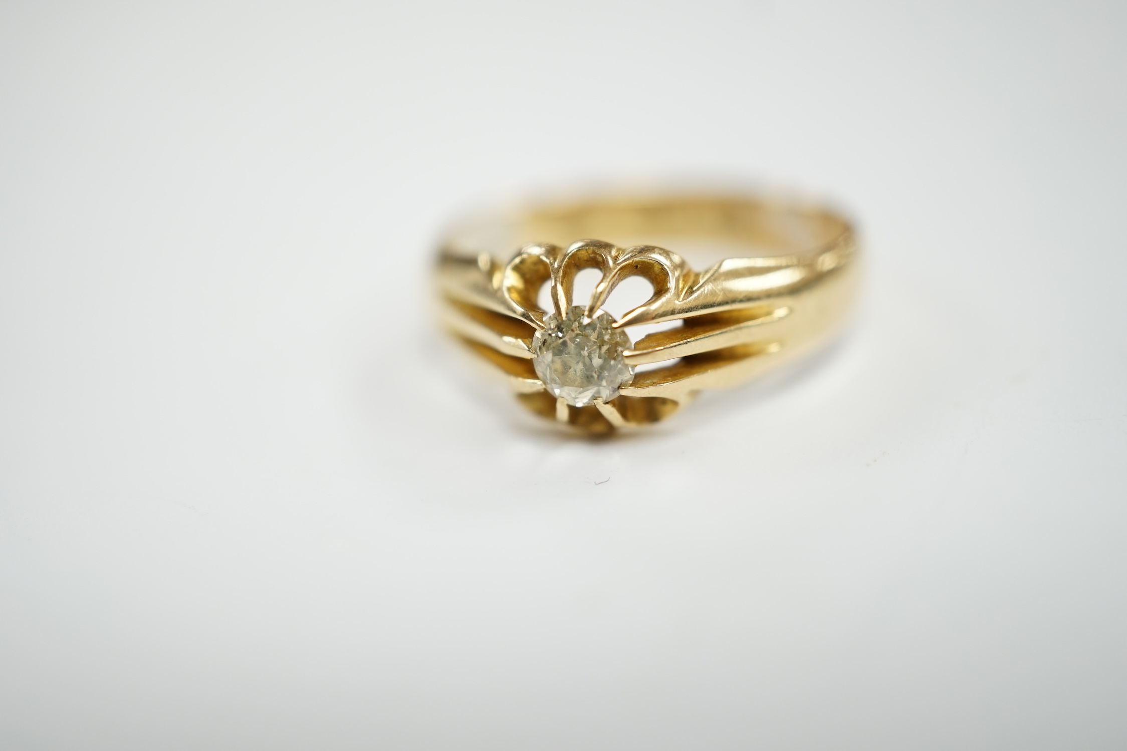 A George V 18ct gold and claw set solitaire diamond ring, size Q, gross weight 4.9 grams.